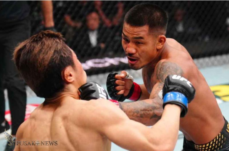 Joshua Van, kanan, berhasil mempertahankan sabuk kelas terbangnya dalam kemenangan telak yang diraih dengan susah payah atas Tatsuro Taira di UFC 328
