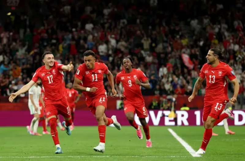 Dan Ndoye merayakan gol kedua buat timnya saat melawan Aljazair