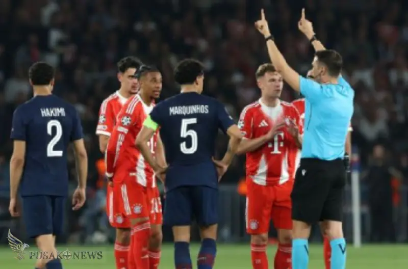 Wasit Sandro Schärer memberikan penalti kepada PSG setelah cek ke monitor VAR di babak pertama.