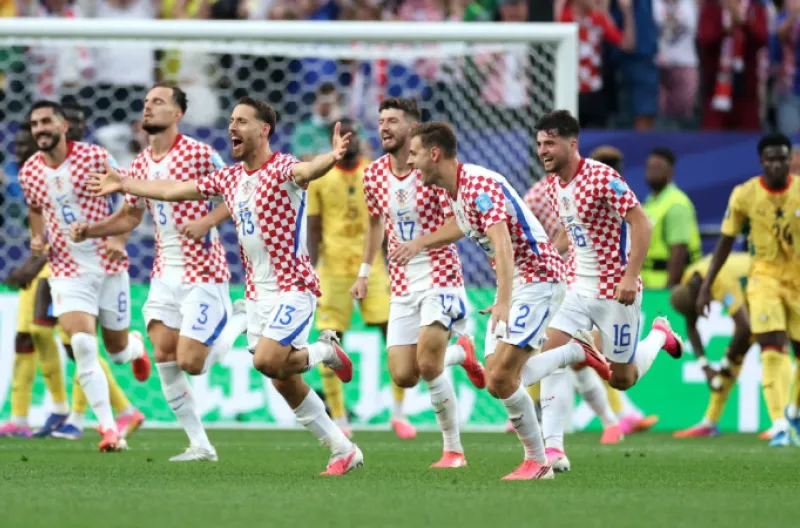 Nikola Vlasic merayakan gol kemenangan Kroasia melawan Ghana.