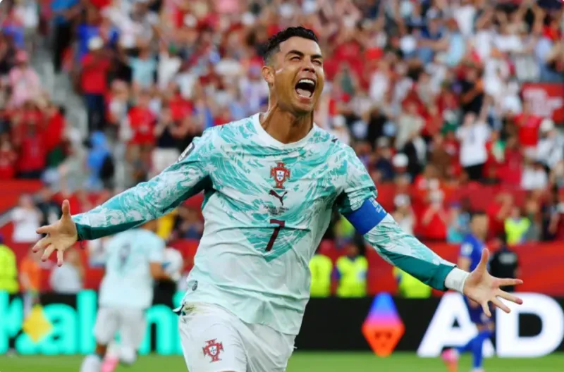 Cristiano Ronaldo dari Portugal merayakan golnya