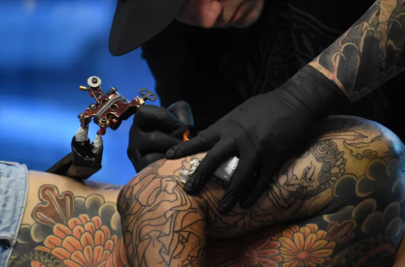 Stu Pagdin mengatakan beberapa desain tato AI tersebut mengandung kesalahan ejaan