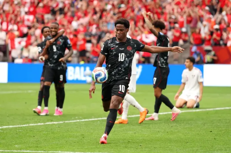 Jonathan David merayakan golnya ke Gawang Qatar
