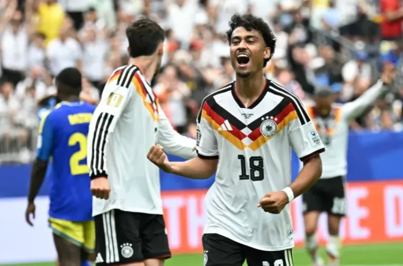 Bek Jerman Nathaniel Brown merayakan setelah mencetak gol selama pertandingan sepak bola Grup E Piala Dunia 2026 antara Jerman dan Curaçao
