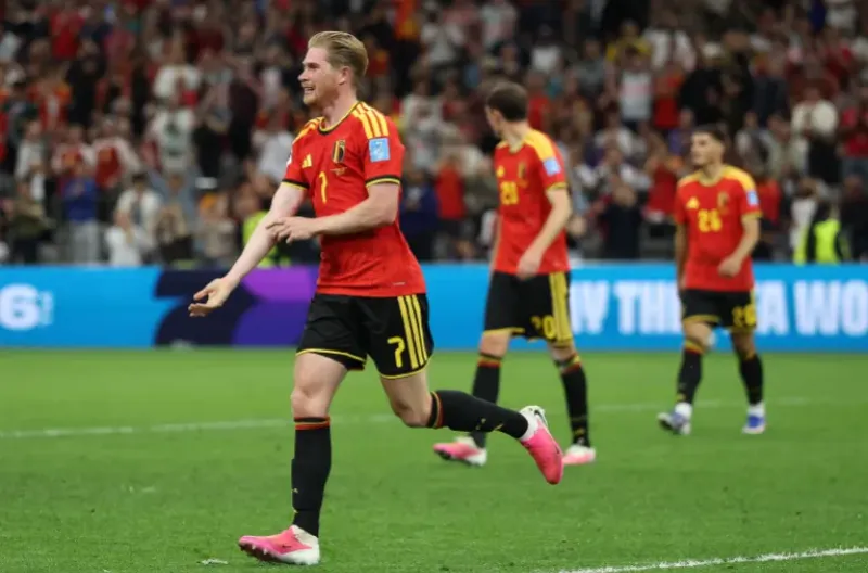 Kevin De Bruyne #7 Belgia merayakan setelah mencetak gol ketiga timnya