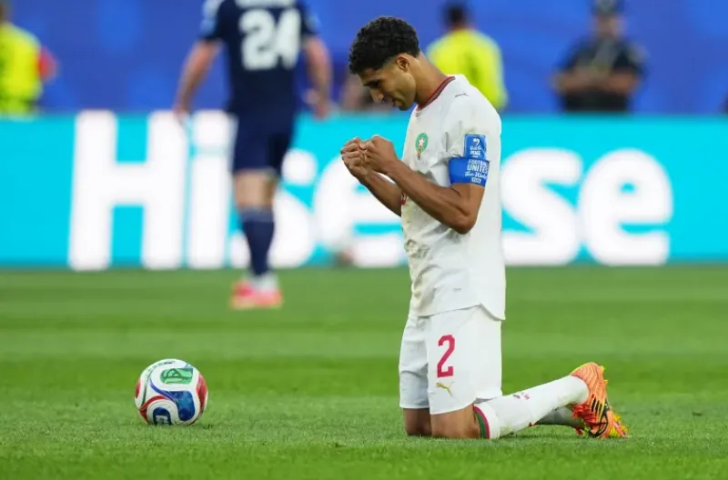 Achraf Hakimi merayakan kemenangan Maroko